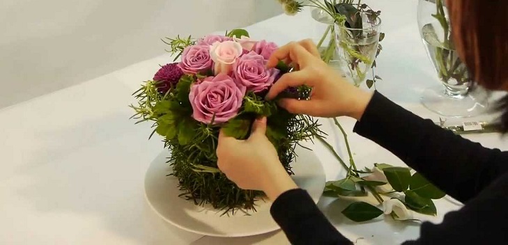 Basteln von Blumen aus eigener Hand, Kompositionen, Foto