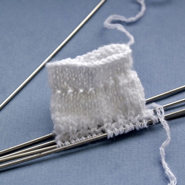 Pagolenok Socke mit gemusterten Stricknadeln