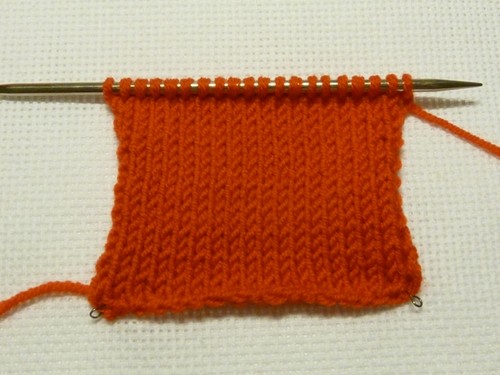 Weste mit Stricknadeln: Diagramm, Foto, Video. Meisterklasse zum Stricken einer Strickweste