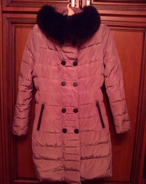 Waschen der Daunenjacke in einer Waschmaschine ist einfach