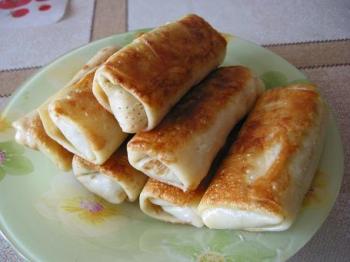 Kochgeheimnisse: Rezepte für die leckersten gefüllten Pfannkuchen mit Fotos und Videos