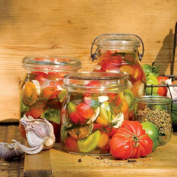 Tomaten mit Knoblauch für den Winter, Rezepte. Tomatenernte mit Knoblauch für den Winter: ein Rezept für schnelles Kochen, ohne Sterilisation, gesalzen ohne zu baden